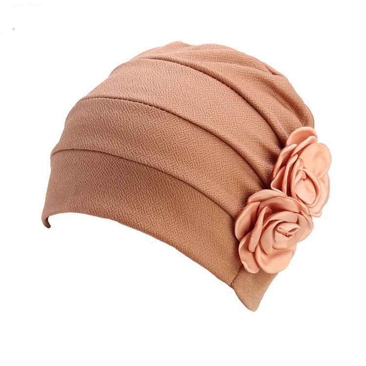 Camel brown chemo cap with pleated design and large fabric rose flower
