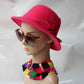 Hot pink wool felt ladies wide-brim hat with large flower detail and bow tie