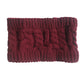 Burgundy knit wool earmuff headband with cable-knit texture and ribbed border