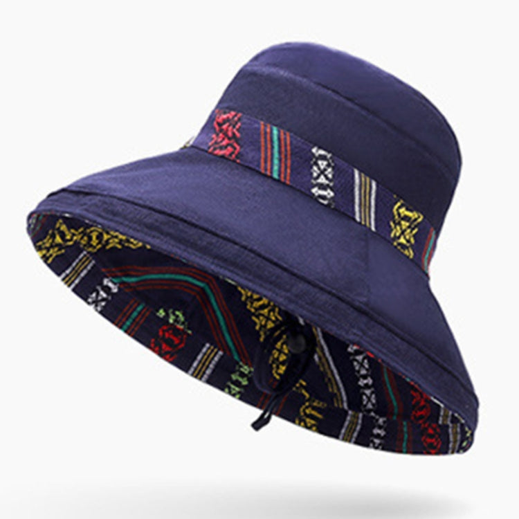 Dark blue wide-brim beach hat with patterned band and colorful embroidered motifs
