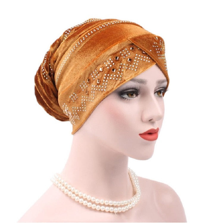 Adjustable rhinestone turban hat in warm tan with sparkling bead trim