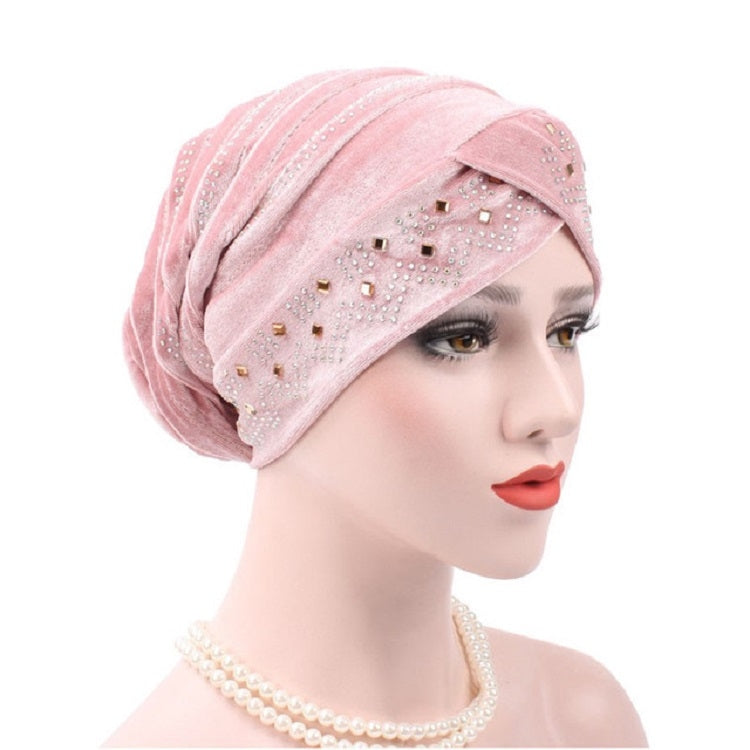 Adjustable rhinestone turban hat in light pink with sparkling bead trim