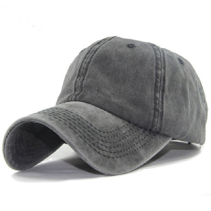 Gray washed cotton baseball cap with curved brim and stitched front panels