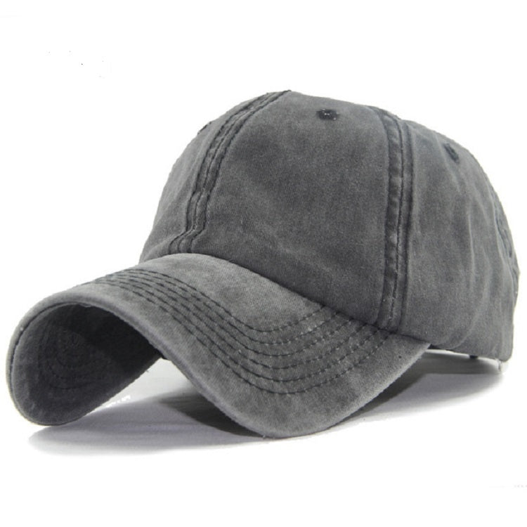 Gray washed cotton baseball cap, front view with curved brim and eyelet ventilation