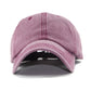 Pink washed cotton baseball cap with curved brim and stitched front panels