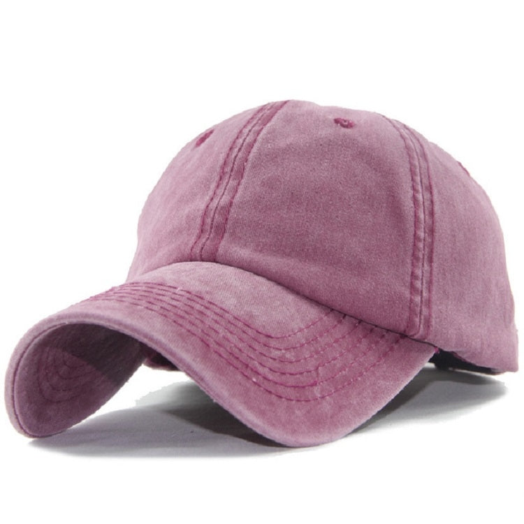 Pink washed cotton baseball cap with curved brim, angled front view