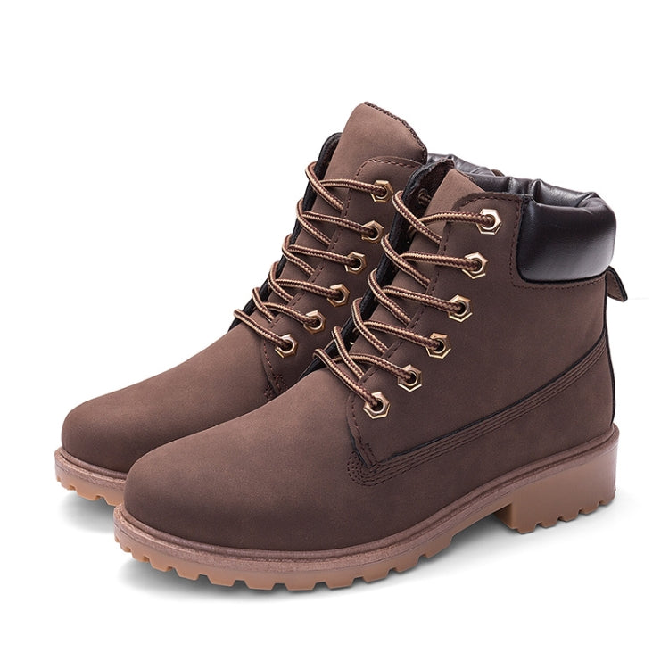 Brown lace-up warm boots with padded collar, side tab, and rugged tan lug sole