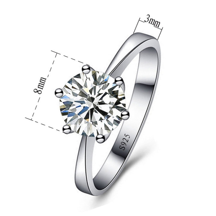 Silver-tone ring with round CZ center stone and six ball prongs, polished slim shank
