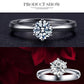 Silver-tone wedding ring with large round clear CZ center and small ball accents