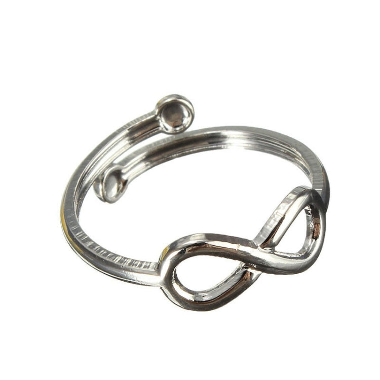 Silver metal toe ring with infinity charm, open-heart loop design