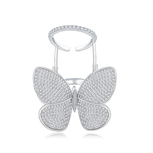 Adjustable butterfly ring with pavé stones in platinum tone