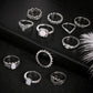 Silver-tone adjustable rings with opal-style stones, assorted ornate bands (11 pcs)