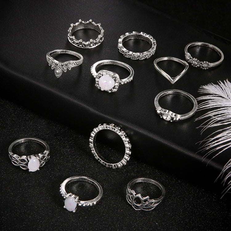 Silver-tone adjustable rings with opal-style stones, assorted ornate bands (11 pcs)