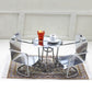 Set of miniature metal dollhouse chairs with heart backrests and silver frame