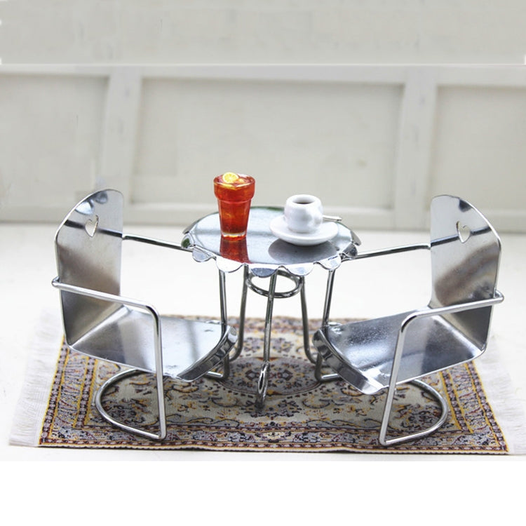 Set of miniature metal dollhouse chairs with heart backrests and silver frame