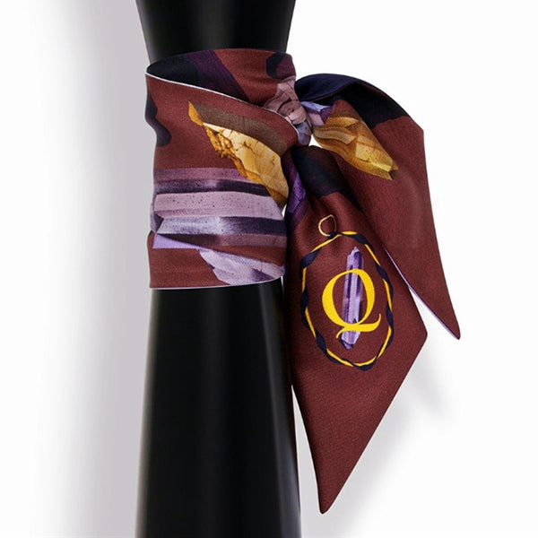 Tarot letter small scarf with gold Q on burgundy print, tied as a neck wrap