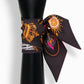 Tarot letter small scarf with ornate sun and chain motifs on dark fabric, tied around neck