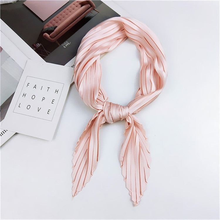 Pink pleated square silk scarf, looped knot with flowing striped ends