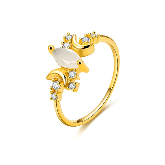 Gold ring with white opal stone and crystal accents