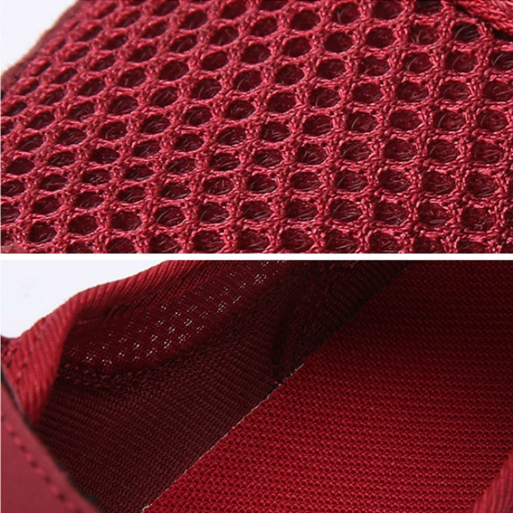 Red breathable mesh fabric swatch with textured knit lining