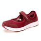 Red mesh slip-on flat sneakers with white outsole and hook-and-loop strap