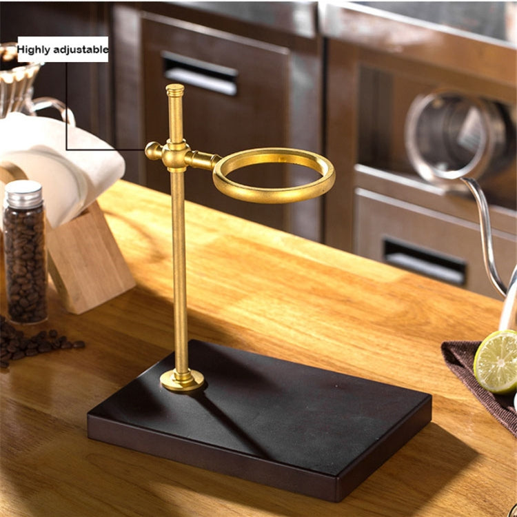 Hand coffee filter holder with brass pour ring on dark spade wood base