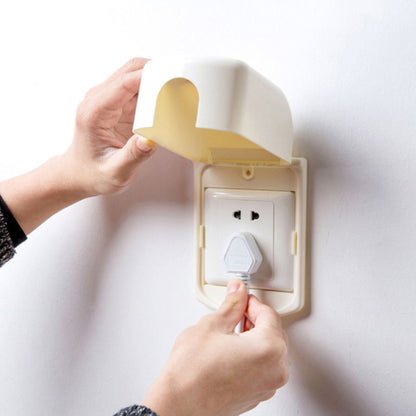 Child switch protective cover with open plug guard, cream and golden-yellow