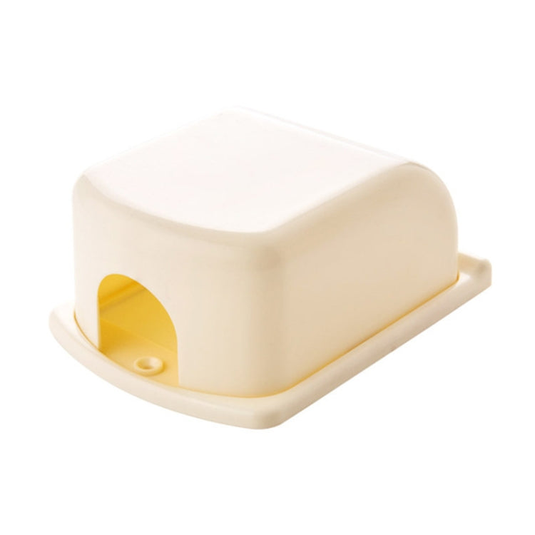 Cream switch protective cover with yellow opening for plug access