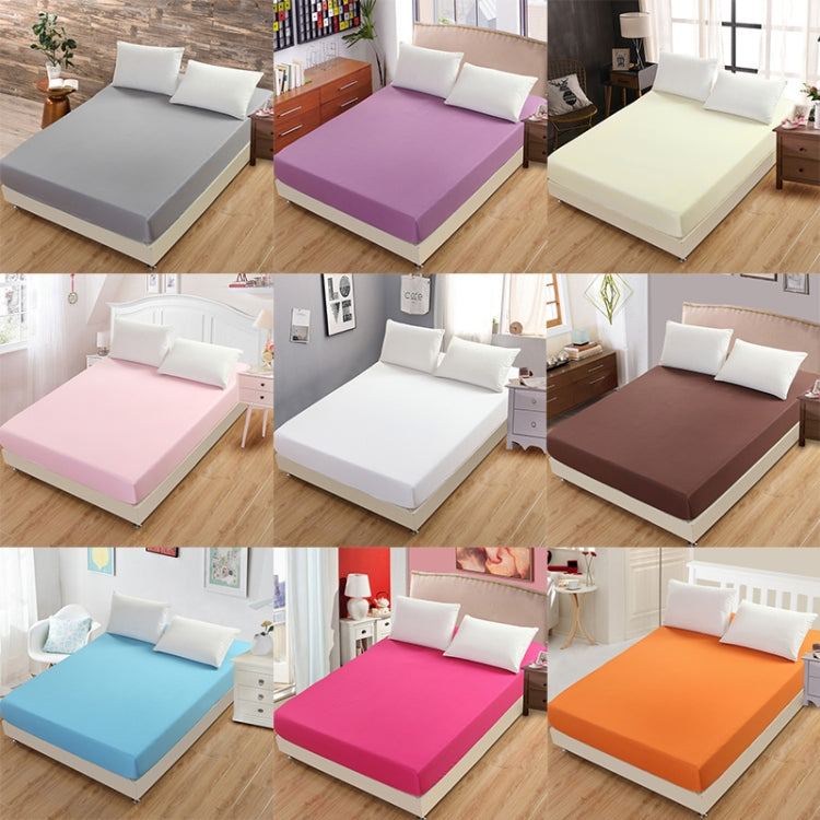 Assorted color fitted mattress protector covers with pillow on top