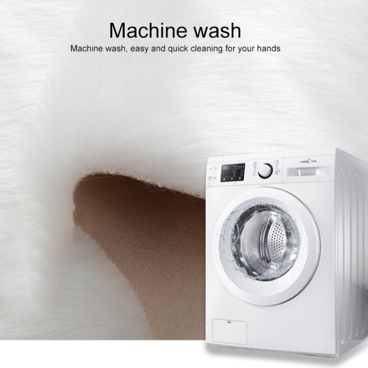 White faux wool cushion mat beside a front-load washing machine