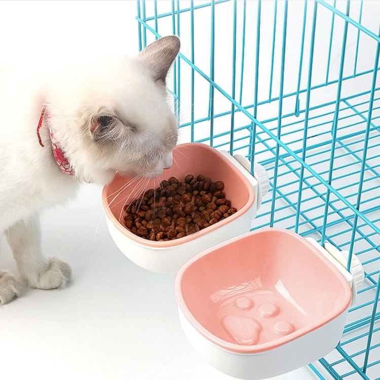 Two-compartment pet feeding bowl set, white base with pink water cup and kibble