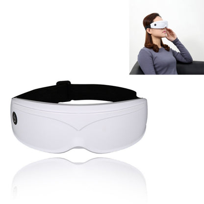 White eye massage eye-protector device with black fabric strap, contoured face cover