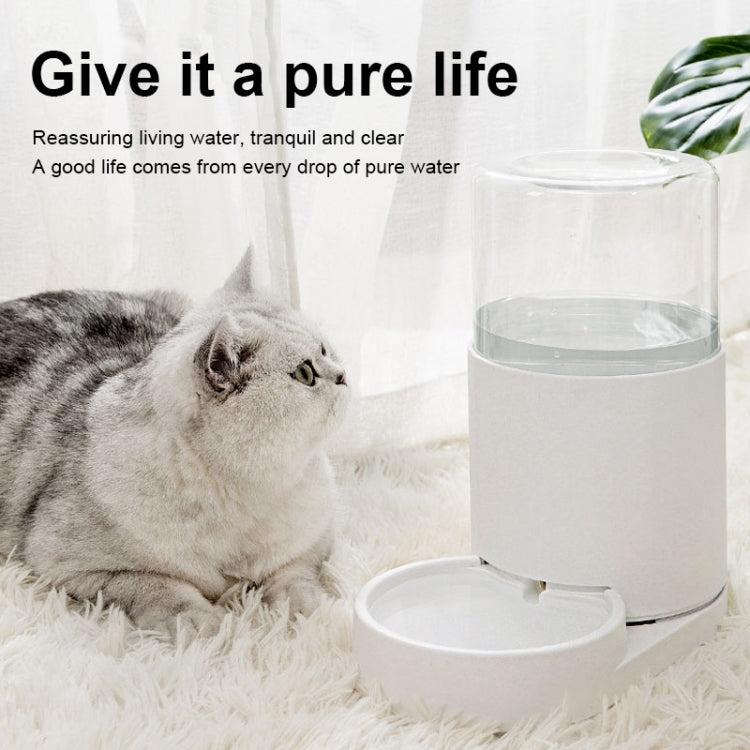 White automatic cat water dispenser with clear tank and drinking bowl, with side tray