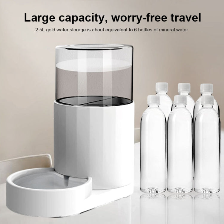 White automatic pet water fountain with drinking base and four clear bottles nearby