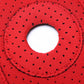 Red knee pad fabric close-up with stitched round grip pad opening