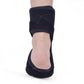 Black plantar fasciitis brace on foot with supportive arch and heel opening