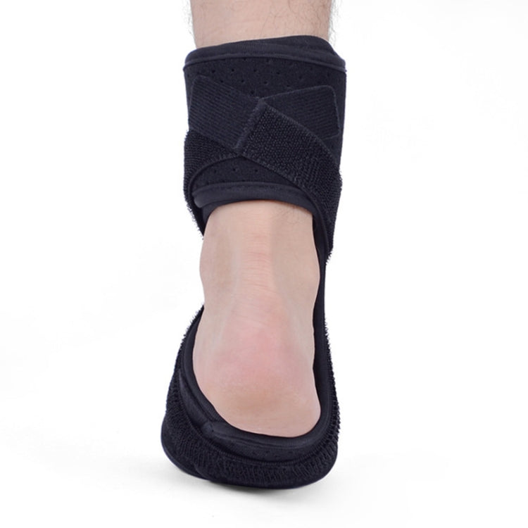 Black plantar fasciitis brace on foot with supportive arch and heel opening