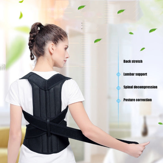 Black posture correction back belt worn over white shirt, with wide lumbar support band