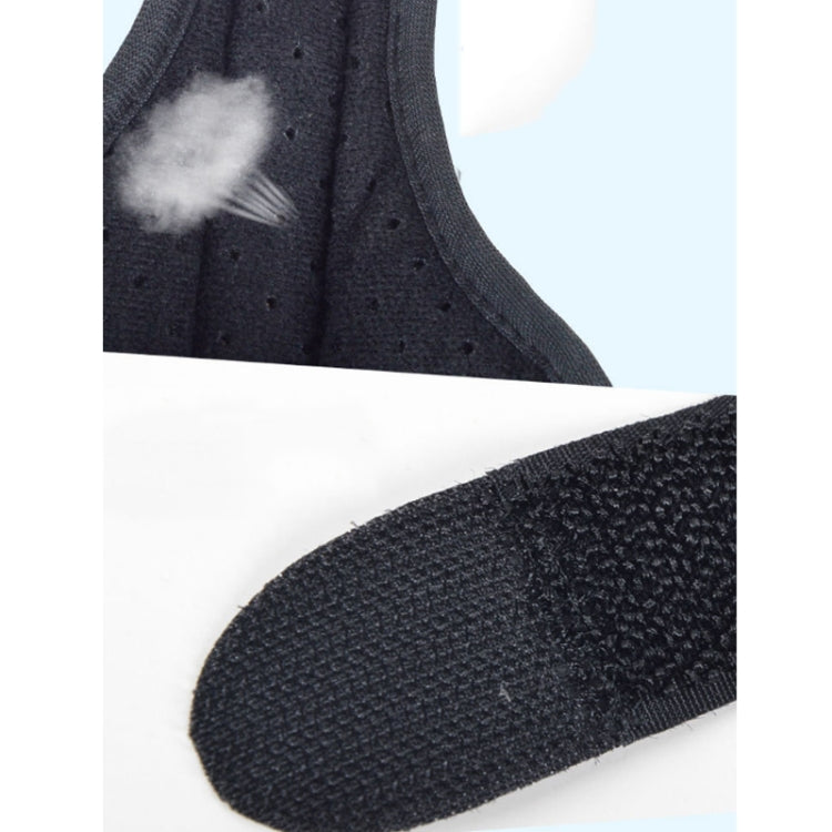 Black textured fabric wrist brace with stitched edging and thumb panel, close-up