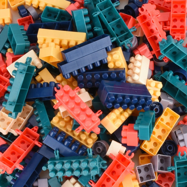 Close-up of large building blocks in red, teal, blue, and yellow assorted colors