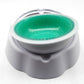 Gray pet cooling bowl base with green textured insert, close-up top view