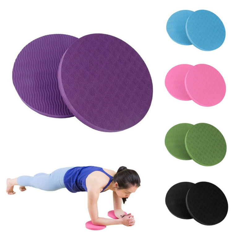 Set of round yoga balance cushions in purple, blue, pink, green, and black