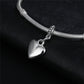 Silver heart charm bead pendant attached to a silver tone chain