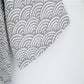 Gray wave-pattern cotton bathrobe sleeve and side seam detail