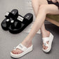 Black rhinestone slide sandals with thick platform sole and open toe, ankle strap