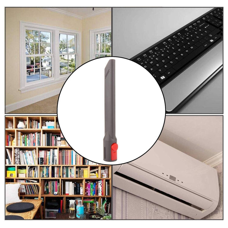 Gray crevice tool with red release button for tight corner cleaning