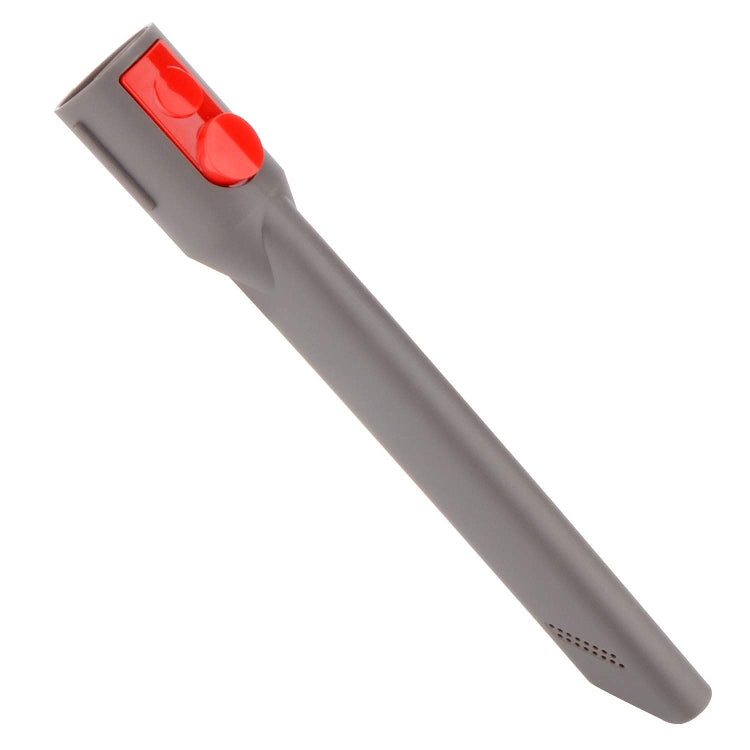 Gray crevice nozzle with red top button, angled for detail vacuuming