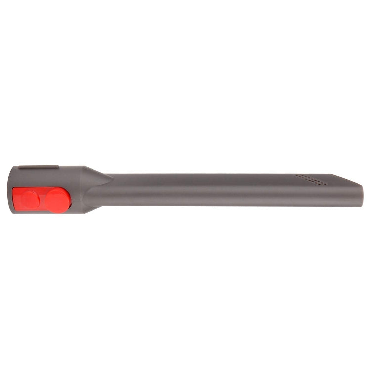 Gray handheld crevice tool with red side button and slim nozzle