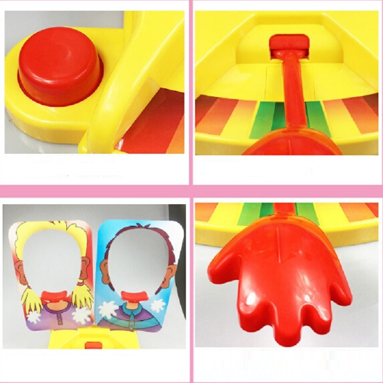 Pie face prank game toy close-ups of red buttons and topping dispenser over yellow board