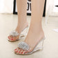 Silver rhinestone slide wedge mules with clear heel and open-toe design